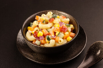 Wall Mural - Macaroni Salad with Bell Pepper, Onion, Corn and Mayonnaise Dressing.