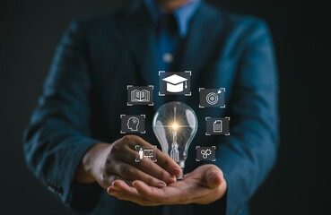 Aufkleber - E-learning graduate certificate program concept. man holding lightbulb showing graduation hat, Internet education course degree, study knowledge to creative thinking idea and problem solving solution