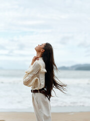 Wall Mural - Serene Summer Beauty: A Young Woman's Blissful Escape to the Tranquil Shores