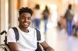© Tixel - Male student in the school hallway  in a wheelchair