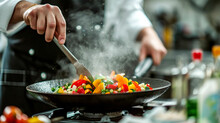 Chef Stirring Colorful Vegetables In Pan At Restaurant Kitchen
