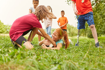 Girls enjoying while playing soccer at park