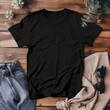 © Artsaba Family - Flat lay of black t-shirt, jeans, sunglasses and beige fabric on wooden surface with succulent plants. Mockup, place for inscription.