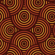 Retro geometric overlapping circles seamless pattern in orange, yellow, red, mustard and brown. For wallpaper, home décor and fabric.