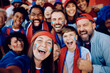 © Drazen - Group of happy sport fans having fun while taking selfie at stadium.