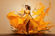 Happy young woman in yellow dress dancing
