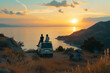 © MNStudio - Couple of friends enjoying scenic Mediterranean view from a road side parked minivan. Travelling in camper van. Planning a road trip adventure.