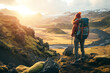 Young hiker with heavy backpack admiring scenic view of spectacular Icelandic nature on a sunset. Breathtaking landscape of Iceland. Hiking by foot.