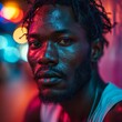 © Marin Zhu - Portrait of a handsome African man with dark skin. Concept: pronounced facial features, illuminated in such a way as to highlight the details and texture of the face