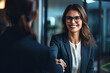Happy mid aged business woman manager handshaking at office meeting. Smiling female hr hiring recruit at job interview, bank or insurance agent, lawyer making contract deal with client