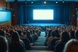© sofian - Back view of audience in the conference hall or seminar meeting with large media screen showing video presentation