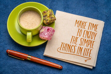 Wall Mural - Make time to enjoy the simple things in life - inspirational note on a napkin with cup of coffee, self care and personal development concept