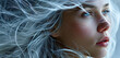 Beauty women with grey hair blowing in the wind close-up portrait of a woman with long hair,