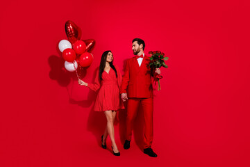 Aufkleber - Full length photo of stunning young hold hands surprise valentine day dressed stylish elegant garment isolated on red color background