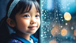 Kind Gesicht Nahaufnahme mit einer Fensterscheibe im Hintergrund wo Regentropfen hinuntergleiten 