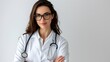 © Athena - Female doctor with stethoscope and with her arms folded. Copy space
