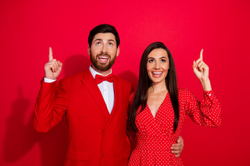 Canvas Print - Photo of classy handsome guy attractive lady cuddle look indicate fingers up empty space ad isolated on red color background