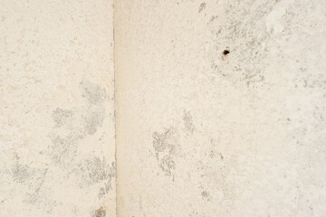 Wall Mural - Grunge background texture of an old white plaster wall. Full frame