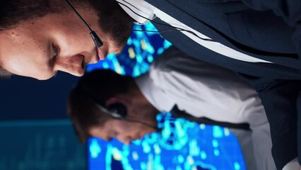 Wall Mural - Workplace of the air traffic controllers in the control tower. Team of professional aircraft control officers works using radar, computer navigation and digital maps.