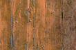 Wooden old texture with shabby orange paint.