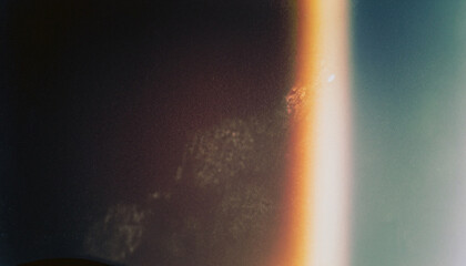 Wall Mural - designed film texture background with heavy grain, dust and a light leak real lens flare shot in stu