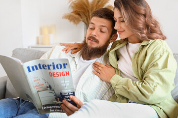 Poster - Happy couple in love reading magazine at home