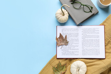 Poster - Composition with books, plaid and autumn decor on color background