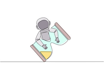 Poster - Continuous one line drawing young astronaut hugging hourglass. The exact countdown, the additional crew who want to land on the lunar surface have arrived. Single line draw design vector illustration