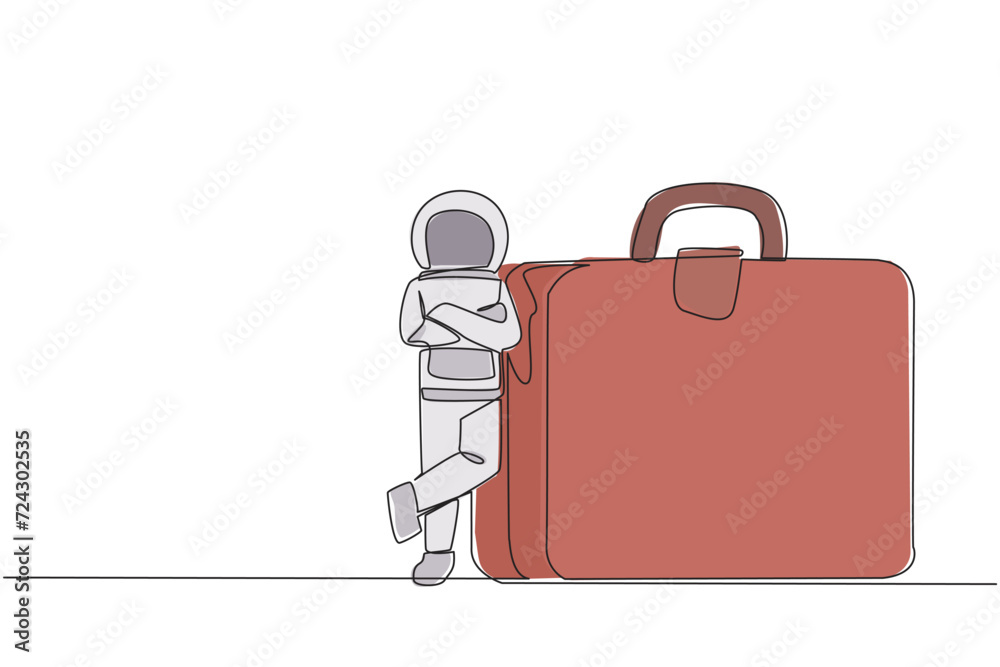 Continuous one line drawing young astronaut lean on big briefcase ...