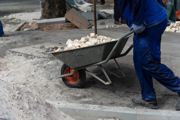 Construction workers are seen at work in Square Cayru in the Comercio neighborhood in the city of Salvador, Bahia.