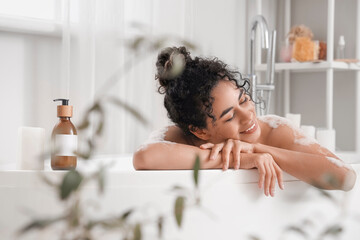 Poster - Young African-American woman taking bath at home