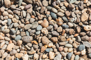 Sticker - Stone Pebbles as an abstract background. Texture