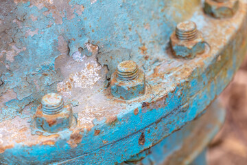 Wall Mural - Rusty bolts on a metal pipe