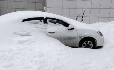 Wall Mural - Car covered with white snow