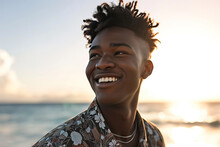 A Joyful Man Basks In The Warm Sun On A Sandy Beach, His Face Beaming With Happiness As He Poses For A Portrait Against The Backdrop Of A Clear Blue Sky And Shimmering Water