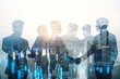 © Who is Danny - Group of businesspeople standing on blurry city backdrop with forex chart. Trade and finance concept. Double exposure.