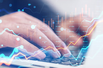 Aufkleber - Close up of hands using laptop keyboard with glowing forex chart on blurry bokeh background. Trade, finance and market concept. Toned image. Double exposure.