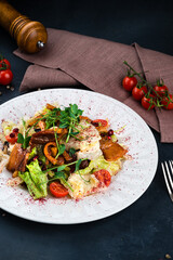 Poster - Georgian food salad with bacon, lettuce, cherry tomatoes, onion, pomegranate seeds and pepper.