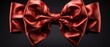 Red bow tie on isolated dark background. Closeup photo of red bow. Red bow tie.