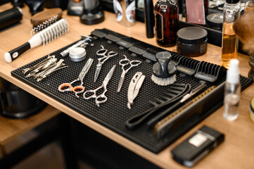 Barbers tools for mens haircuts laid out on a table