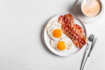 Canvas Print - Breakfast with fried eggs, bacon and coffee