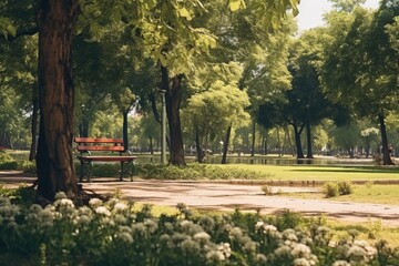 Aufkleber - A picture of a park with a bench in the middle. This image can be used to depict relaxation, nature, or a peaceful outdoor setting