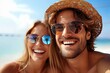 © Pinklife - Amidst the vibrant summer sky, a woman with a beaming smile captures the perfect vacation moment with her fashionable eyewear and sun hat, while the man beside her rocks cool sunglasses and goggles