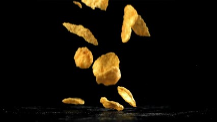 Sticker - Corn flakes falling on black background. Filmed on a high-speed camera at 1000 fps. High quality FullHD footage