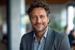 © ADDICTIVE STOCK - Confident businessman with a friendly smile Generative AI image