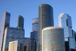 Moscow City International Business Centre dense standing high skyscraper buildings against cloudless blue sky