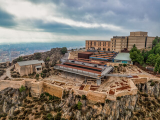 Canvas Print - Aerial view of the excavated ruins of the ancient Jewish quarter Juderia synagogue in Lorca castle Spain 