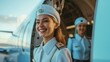 Portrait of a smiling stewardess at the entrance to the plane, civil aviation, the stewardess is waiting to meet the arriving passengers