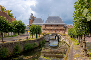 Wall Mural - The Koppelpoort, Medieval gate in the Dutch city, Unique combination land, Water-gates and is part of the second city wall, Amersfoort, A city and municipality in the province of Utrecht, Netherlands.