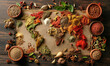 Spices on the map. Colorful various herbs and spices for cooking in the shape of a world map background. Assortment of natural spices. Healthy spice concept.